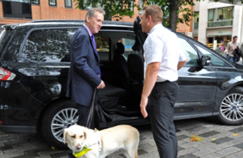 Guide Dog accessing Taxi